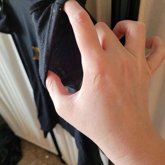 Women's size medium black cold shoulder style tunic top w/ gold cross - Picture 3 of 5